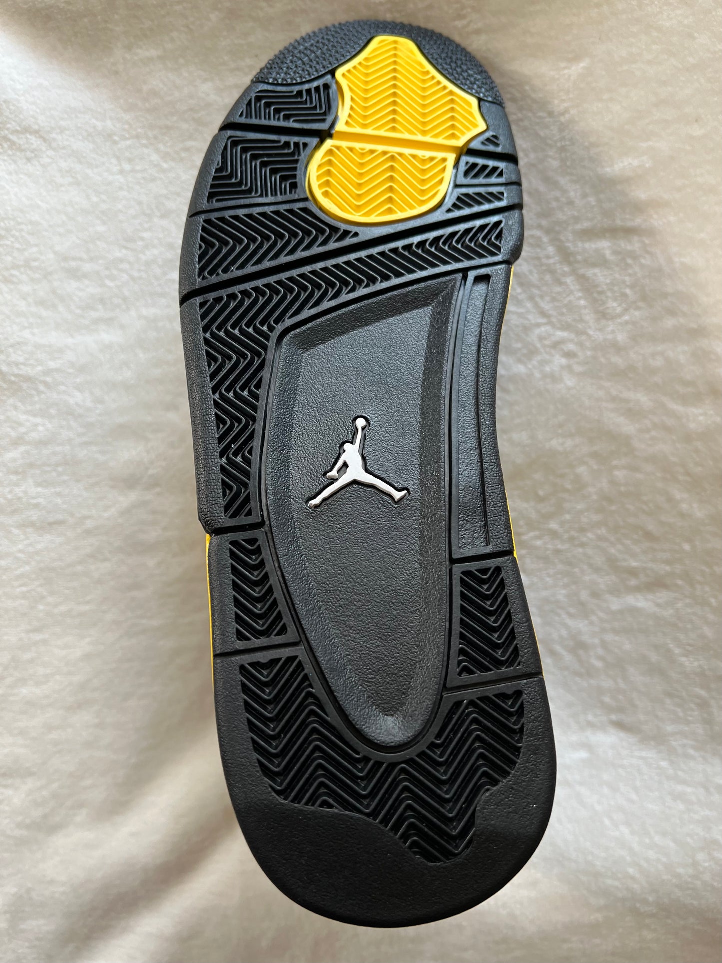 Air Jordan Retro 4 “Thunder”